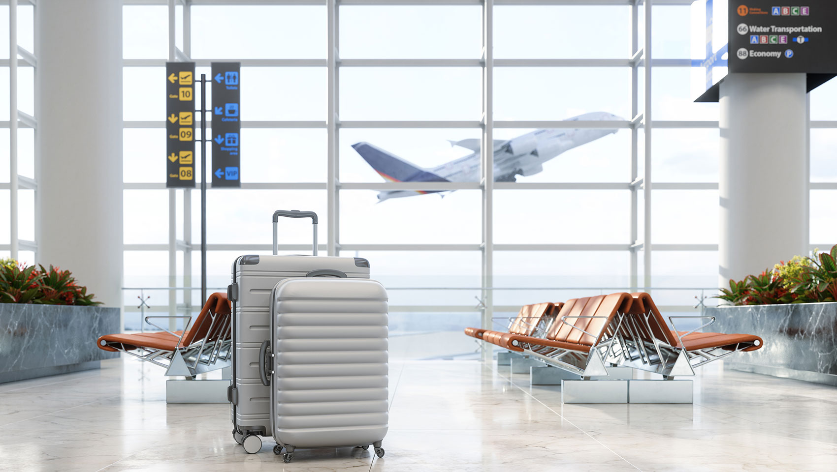 shot of airport with suitcases and plane taking off