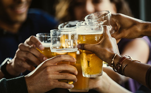 Group cheers-ing beers