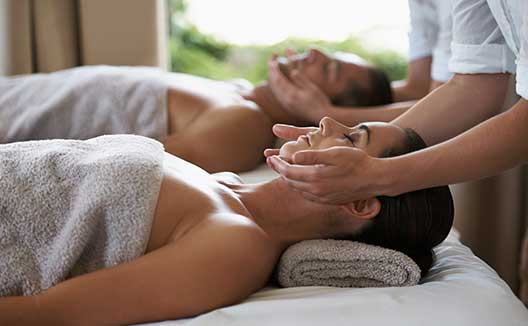 couple receiving a massage treatment